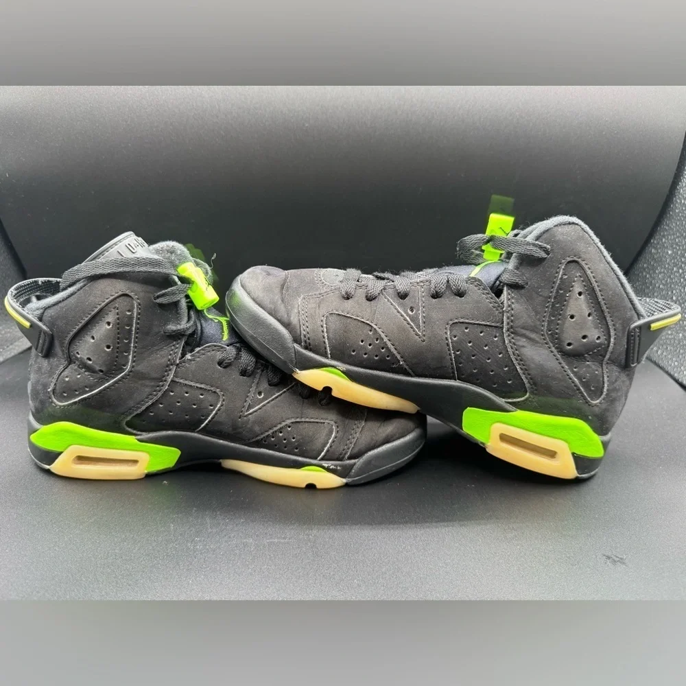 Jordan Black and Green Sneakers with Air Unit and Perforated Panels